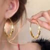 Fluid Wave Gold Hoops